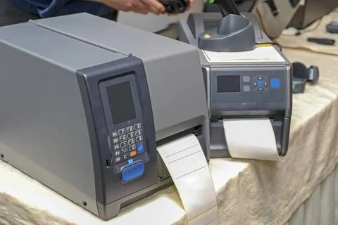 Barcode Label Printers Two Barcode Label Printers Equipment for Distributi... Stock-Fotos