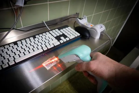 Barcode is scanned with a barcode scanner Stock-Fotos