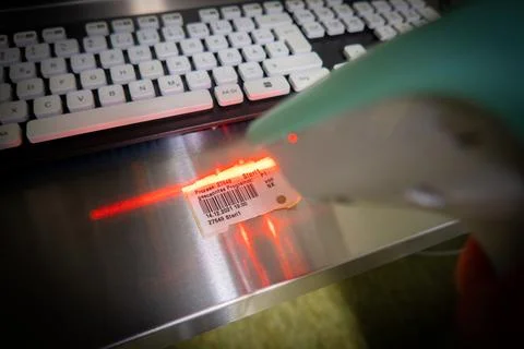 Barcode is scanned with a barcode scanner Stock-Fotos