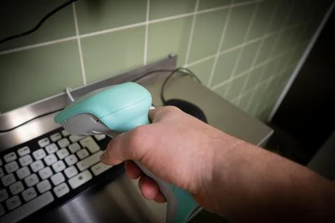 Barcode is scanned with a barcode scanner Stock-Fotos
