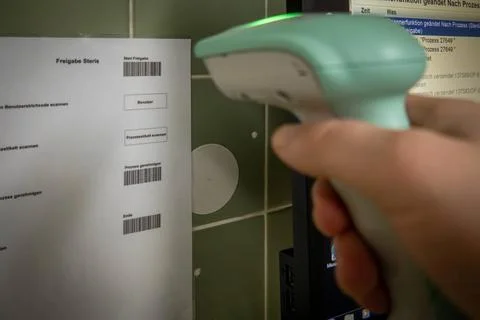 A barcode is scanned with a barcode scanner Foto stock