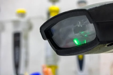 Barcode scanner ready for scan bar code of medical items on table in lab Foto stock