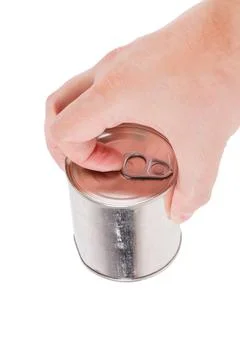 Bare caucasian hand opens a tin can with a pull ring on a white background Stockfoto's