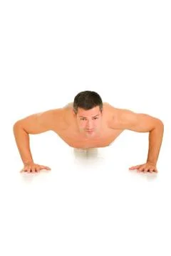 Bare chested man does push-ups isolated on white background Stock Photos