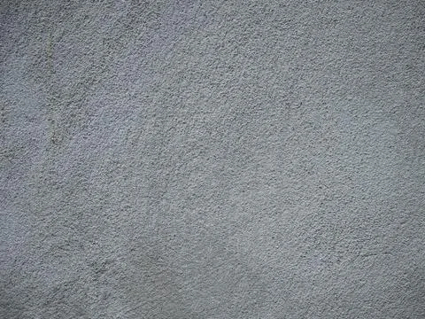 Bare concrete wall, rough surface. Stock Photos