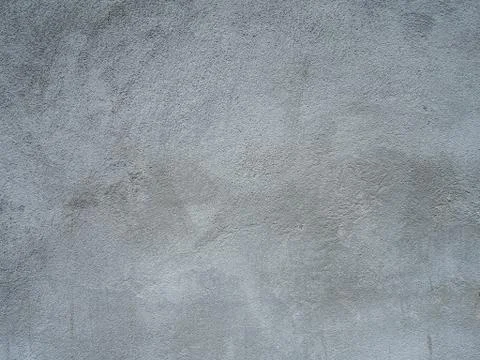 Bare concrete wall, rough surface. Stock Photos