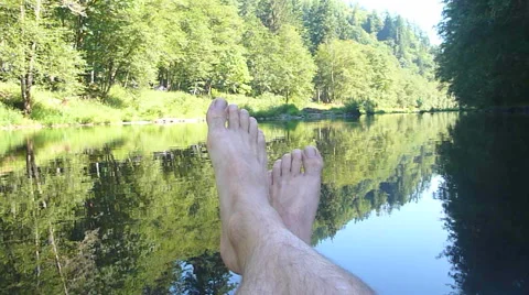 Bare Feet Floating Oregon River 2 Stock Footage 40443835