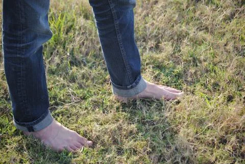 Bare feet in grass 写真素材