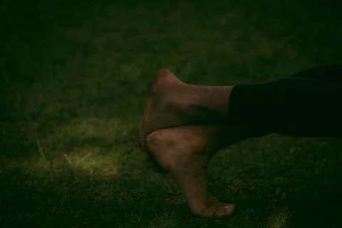 Bare feet in the grass Stock Photos