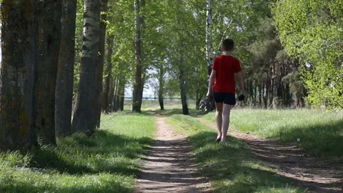 Bare feet walking on the grass, concept of freedom and happiness Stock Footage 89612903