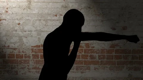 Bare Fisted Shadow Boxing Against Brick Background Stock Footage 8777448