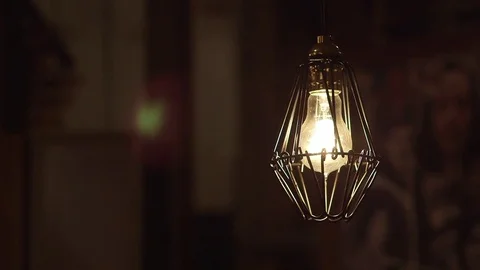 Bare Incandescent Light Bulb In Dimly Lit Building 動画素材 82290231