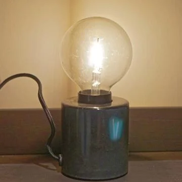 Bare light bulb Stock Photos