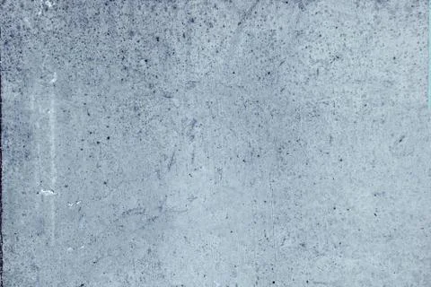 Bare untreated plaster wall with a rough textured surface in shades of blue Stock Photos