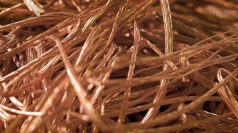 Bare wires of copper cables are lying in a heap of scrap metal in factory Stock Footage 81488434