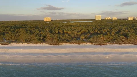 Barefoot Beach aerial view into the back waters Stock Footage 86843539