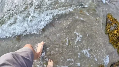 Barefoot on a beach Stock Footage 167836985