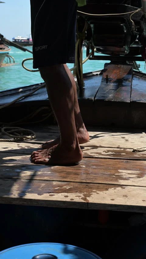 Barefoot Boat Operator Standing Beside Longtail Boat Engine Stock Footage 337537995