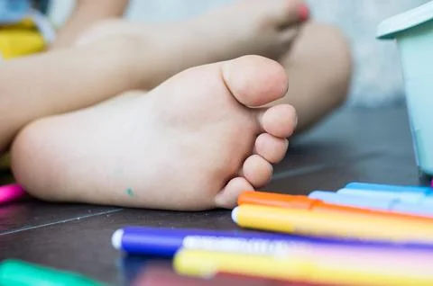 Barefoot boy drawing Stock Photos