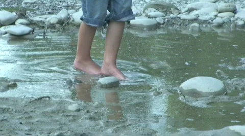 Barefoot from dead to clean water Stock Footage 808046
