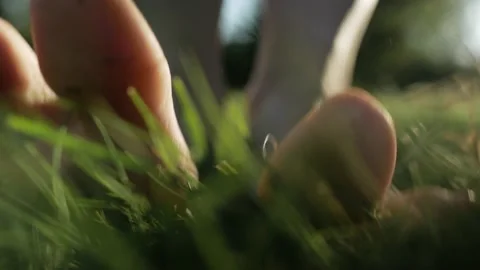 Barefoot on the grass Stock Footage 148023829