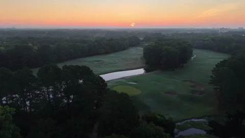 Barefoot Landing SC golf course aerial at sunrise Stock Footage 340625676