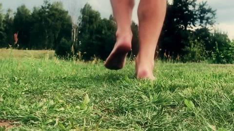 Barefoot man runs Stock Footage 92908044