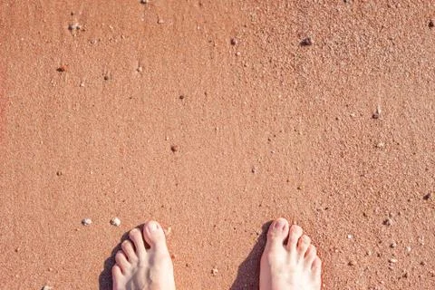 Barefoot on sand Stock Photos