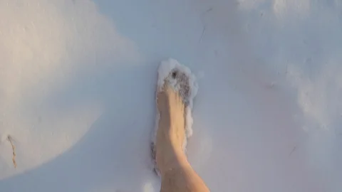 Barefoot in the snow Video stock 102723928