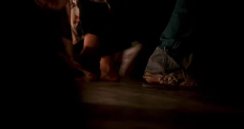 Barefoot Steps on Dark Floor in Dimly Lit Indoor Setting - Close-Up Stock Footage 336038378
