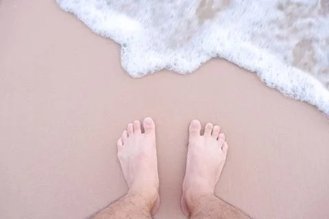 Barefoot on Summer Beach Stock Photos