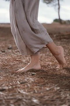 Barefoot Walking on Pine Needle Path in Nature Stock Photos