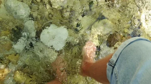 Barefoot walking on the rock Stock Footage 139303570
