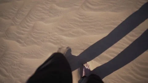 Barefoot walking in the sand. Man walking in the desert. Stock Footage 150555257