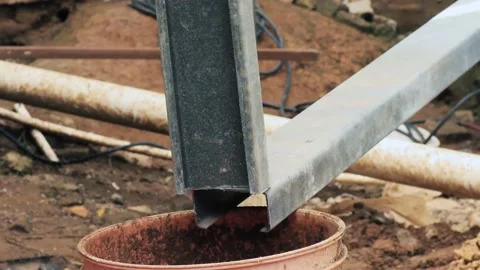 Barehanded experienced construction worker pulling apart recently cut c Stock Footage 171442286