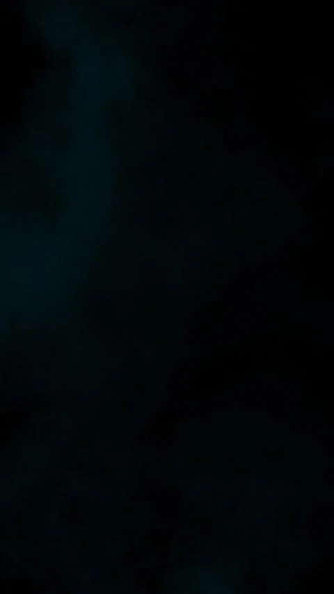 Barely visible cyan smoke for subtle texture, vertical format Stock Footage 340130735