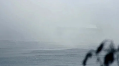 Barely visible Ferry moving through thick Fog Stock Footage 23224445