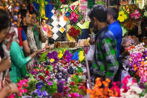 Bargaining is going on between buyers and sellers in decoration flower shop Stock Photos
