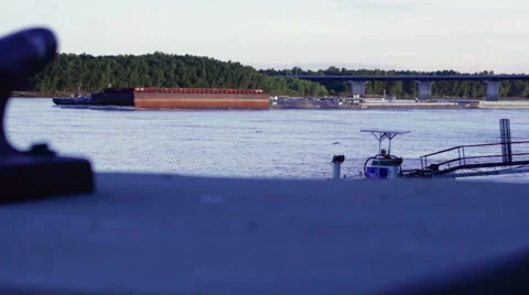 Barge and Bollard: Rack Focus On The Mississippi River Stock Footage 41921657