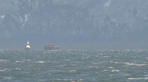Barge and Tug Battered by Wind, Waves, and Spray Stock Footage 8974362