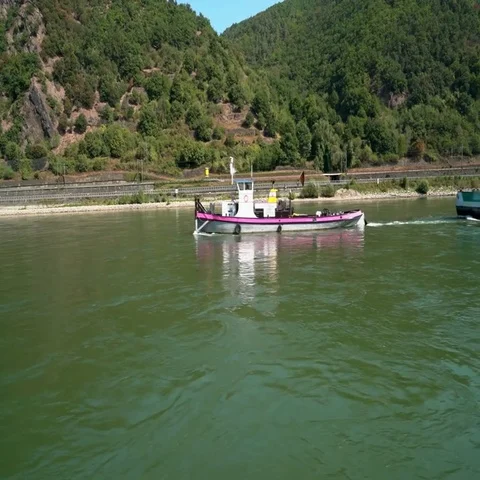 Barge beeing pulled down the rhine Stock Footage 69542406