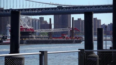Barge Crane Sails Under Manhattan Bridge NYC Stock Footage 78131961