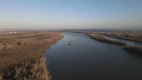 Barge on Danube tug boat push barges for river transport Stock Footage 236176163