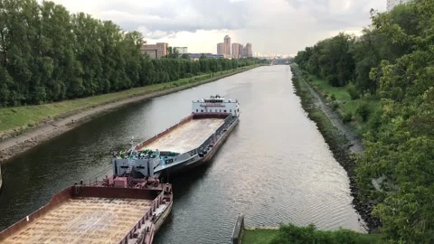 Barge enters the canal lock Stock Footage 281385813