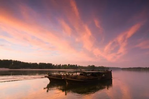 Barge at evening sky Stock Photos