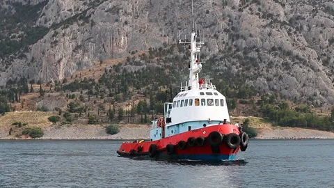 Barge floating in the bay against the backdrop of the mountains. Stock Footage 119270028