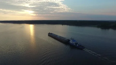 A barge floating in the river at dawn. Aerial view. 스톡 동영상 64803846