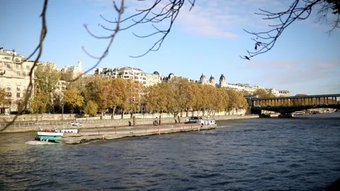 Barge floating on the river Seine on a fall day in Paris Video stock 317078833