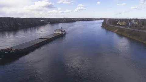 The barge floats along the river Stock Footage 76873504