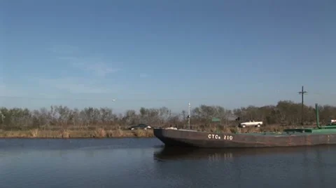 Barge floats down river Stock Footage 8653242